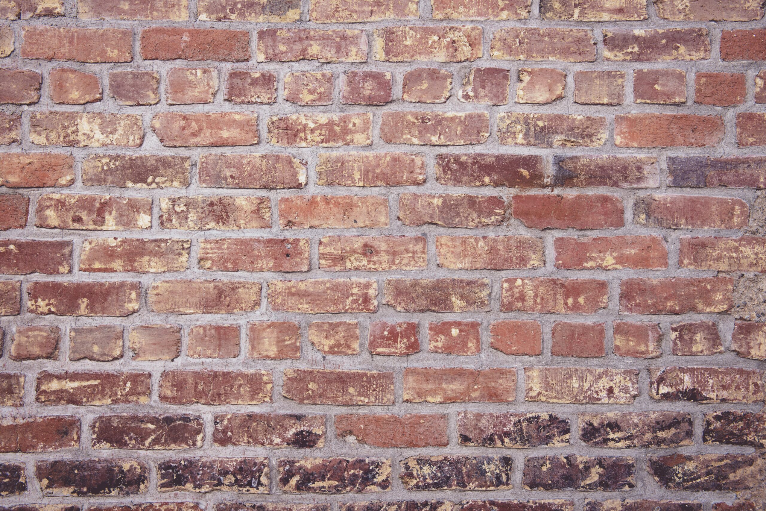 High-quality image of a classic red brick wall, perfect for design or architectural projects.